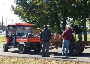 Picture of staff loading tables